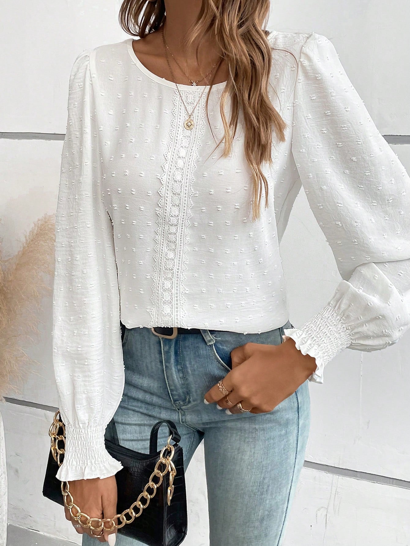 Blusa Texturizada com Detalhes e Punho com Elástico Blusa Texturizada com Detalhes e Punho com Elástico