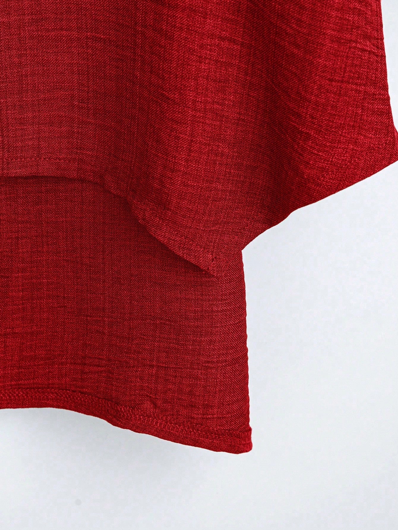 Blusa Assimétrica com Manga 3/4 e Tecido Texturizado Blusa Assimétrica com Manga 3/4 e Tecido Texturizado