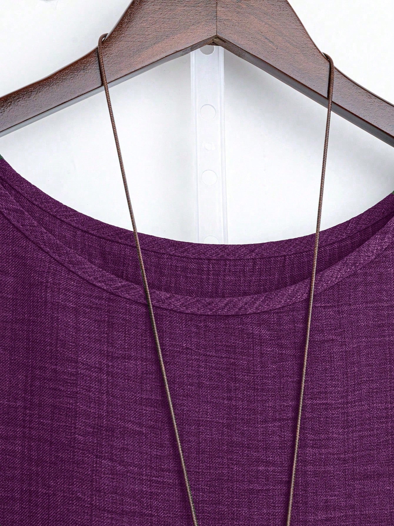 Blusa Assimétrica com Manga 3/4 e Tecido Texturizado Blusa Assimétrica com Manga 3/4 e Tecido Texturizado