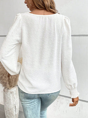 Blusa Texturizada com Detalhes e Punho com Elástico Blusa Texturizada com Detalhes e Punho com Elástico