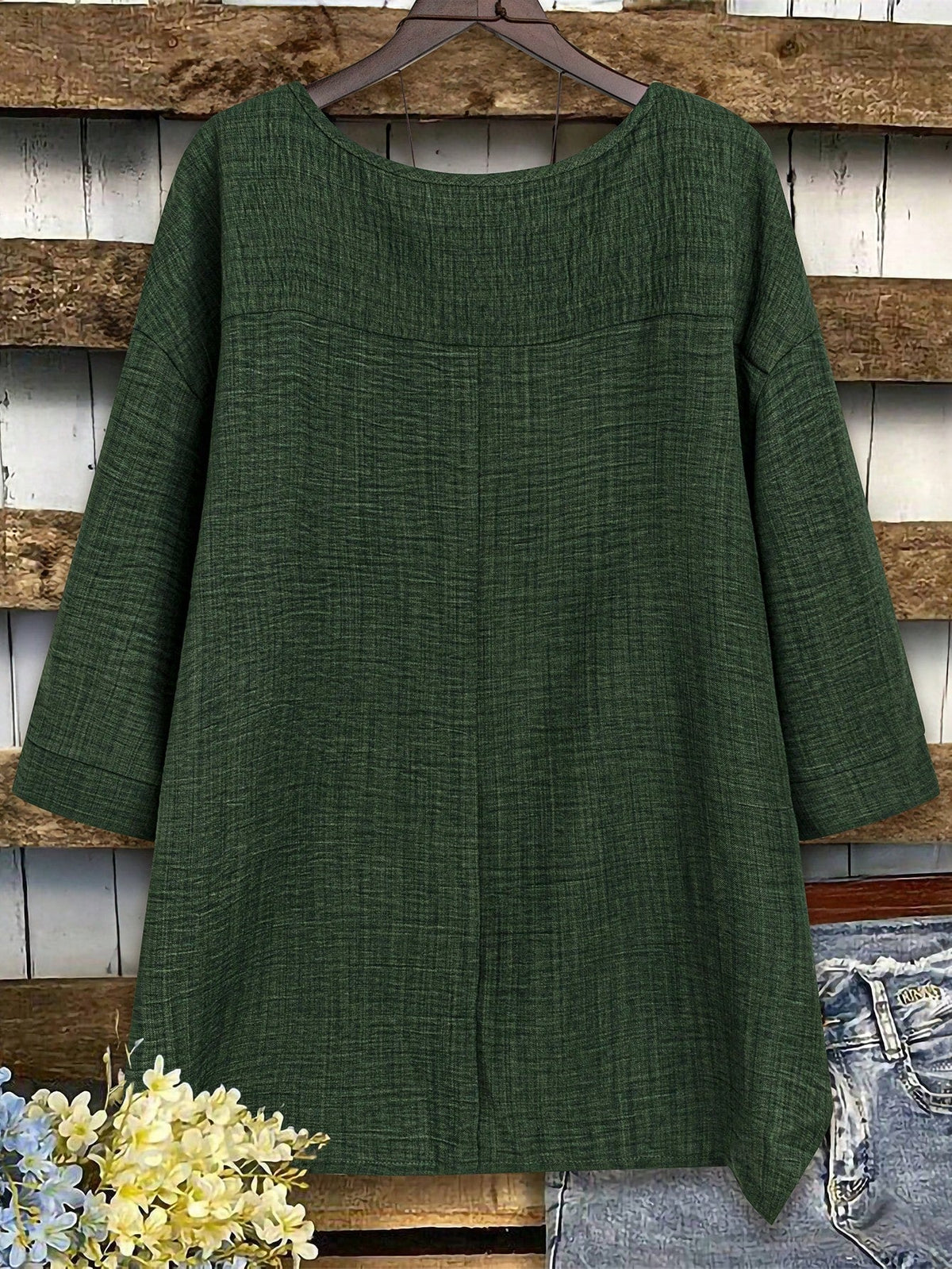 Blusa Assimétrica com Manga 3/4 e Tecido Texturizado Blusa Assimétrica com Manga 3/4 e Tecido Texturizado