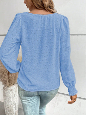 Blusa Texturizada com Detalhes e Punho com Elástico Blusa Texturizada com Detalhes e Punho com Elástico