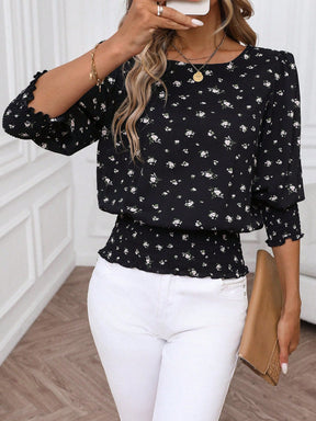 Blusa Floral com Elástico na Barra e Manga 3/4 Blusa Floral com Elástico na Barra e Manga 3/4
