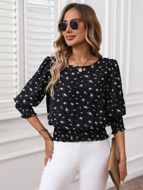 Blusa Floral com Elástico na Barra e Manga 3/4 Blusa Floral com Elástico na Barra e Manga 3/4