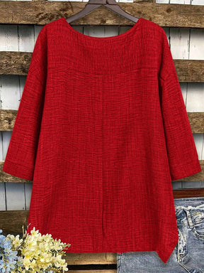 Blusa Assimétrica com Manga 3/4 e Tecido Texturizado Blusa Assimétrica com Manga 3/4 e Tecido Texturizado