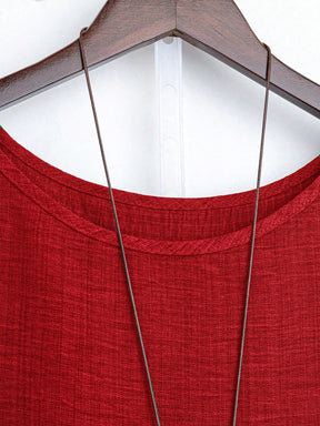 Blusa Assimétrica com Manga 3/4 e Tecido Texturizado Blusa Assimétrica com Manga 3/4 e Tecido Texturizado