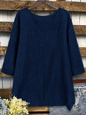 Blusa Assimétrica com Manga 3/4 e Tecido Texturizado Blusa Assimétrica com Manga 3/4 e Tecido Texturizado