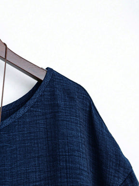 Blusa Assimétrica com Manga 3/4 e Tecido Texturizado Blusa Assimétrica com Manga 3/4 e Tecido Texturizado