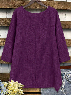 Blusa Assimétrica com Manga 3/4 e Tecido Texturizado Blusa Assimétrica com Manga 3/4 e Tecido Texturizado