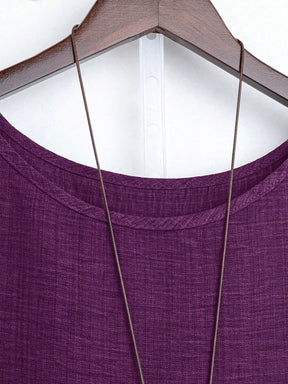 Blusa Assimétrica com Manga 3/4 e Tecido Texturizado Blusa Assimétrica com Manga 3/4 e Tecido Texturizado