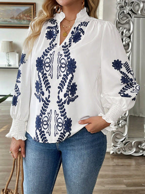 Blusa com Bordado Floral e Manga Longa Elegante Blusa com Bordado Floral e Manga Longa Elegante